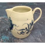 A Worcester barrel shaped  robin-beak jug, decorated in underglazed blue with Barrel Jug Scroll