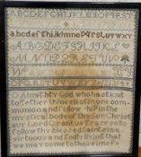 A late 19th century needlework sampler, embroidered with alphabet and verse, 32cm x 27cm, framed