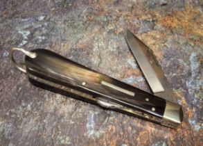 A Stan Shaw blade lock knife, polished buffalo scales, vacant cartouche, work back to spring and