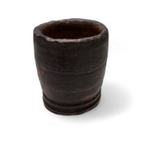 A small 18th century softwood dug-out one-piece treen vessel, one piece with ribbed details c.