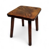 A 19th century rustic oak pollard stool, canted rectangular top, splayed legs, 34cm high, 28cm wide