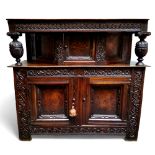 A scarce mid 17th century English oak marquetry court cupboard, Elizabethan style, Leeds Area,
