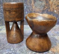 Treen - a 19th century salt measure, of conical form, 11cm high; another, 16cm high (2)
