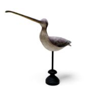 Folk Art - a painted softwood avian decoy, carved as a curlew, turned display stand, 32cm high