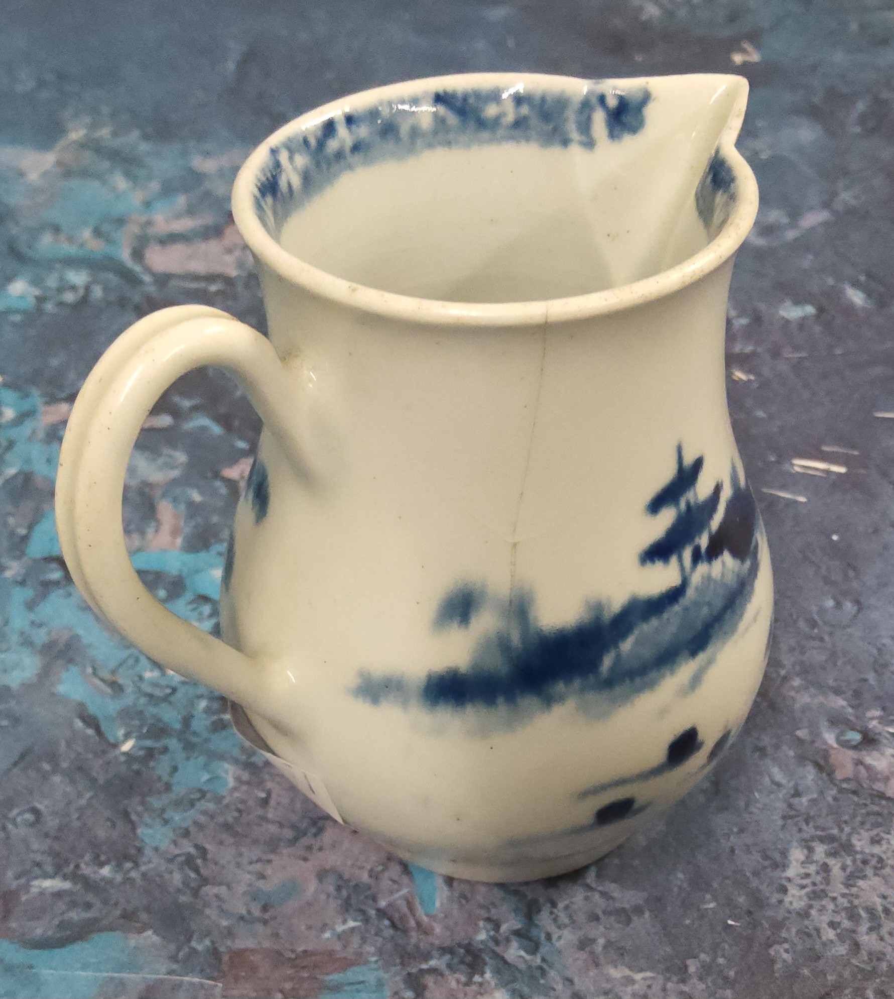 An early Worcester Cannonball pattern  sparrowbeak jug, painted with pine trees, hut and rock - Image 3 of 4