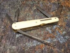 **THIS LOT IS WITHDRAWN**A Stan Shaw pocket knife four blades, nail file and spike, ivory scales,