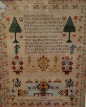 A Victorian needlework sampler, embroidered by Sarah Matilda Guest, aged 12, 1853, with verse,