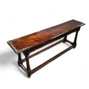 A mid 17th century English oak joint stool bench,46cm high, 121cm wide, 25cm depth