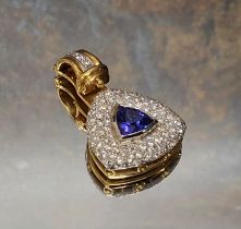A 18ct gold South African Tanzanite and diamond Reuleaux shaped pendant, a central collett set