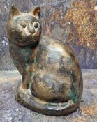A bronzed cat, seated, looking to the left, 21cm high