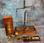 A 19th century brass student microscope, 16cm high, fitted mahogany case; a 19th century set of
