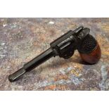 An early 20th century novelty pipe, as a revolver, 13cm long