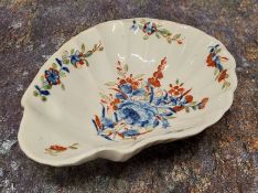 A Worcester rare shell shaped Formal Rose pattern dish,  painted in underglazed blue and iron red,