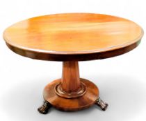 A 19th century mahogany circular centre table, spreading octagonal column, dished base with   bold