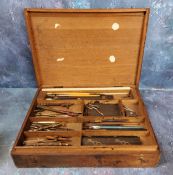 An early 20th century mahognay draughtsman’s drawing instruments box, the interior with pens,