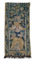 A late 17th century/early 18th century woolwork tapestry fragment, embroidered with lady holding a