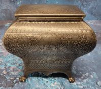 A late 19th century pewter bombe tea caddy,  engraved with foliate scrolls within a basket weave