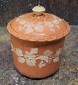 A Grainger’s or Locke Worcester pate sur pate jar and cover, the salmon ground decorated with