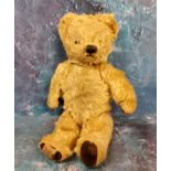 A Chad Valley jointed mohair musical bear, small ears, horizontal stitched snout, velvet pads,