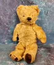 A Chad Valley jointed mohair musical bear, small ears, horizontal stitched snout, velvet pads,