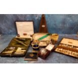 A Paquet metronome;  a silver napkin ring;  plated open salts;  part manicure sets;  etc