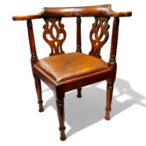 A Victorian ash and elm captains corner chair, pierced vasular splat, drop in seat, c.1850