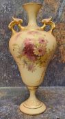A Royal Worcester pedestal ogee shaped two handled vase, printed and painted with summer flowers,