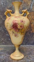 A Royal Worcester pedestal ogee shaped two handled vase, printed and painted with summer flowers,