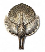 An unusual silver and niello articulated brooch,  in the form of a peacock, stamped Siam Sterling