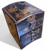 An early 20th century Japanese black lacquered jewellery box, hinged cover, 23cm high, 17cm wide,