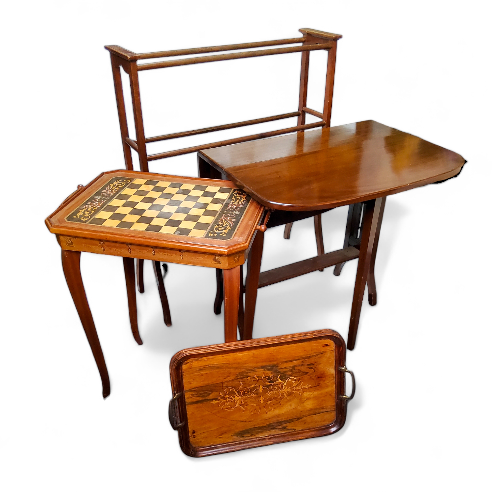 A Sheraton Revival chessboard/ games table, the tray top revealing a niche for chess pieces; towel