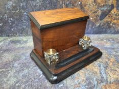 A Victorian walnut and ebonised stationery box, hinged slope cover, the interior with letter