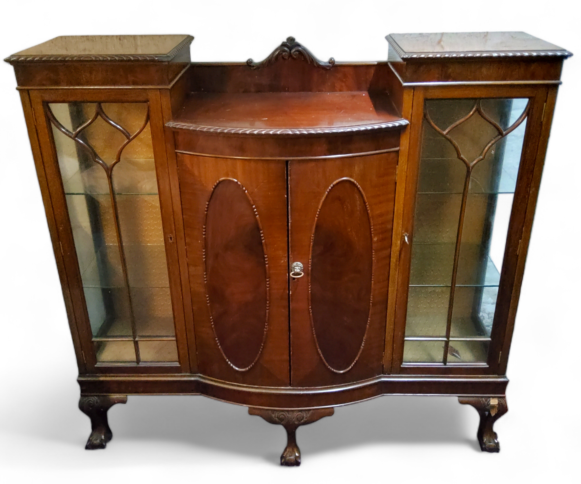 A Victorian mahogany bowed breakfront display cabinet c.1900