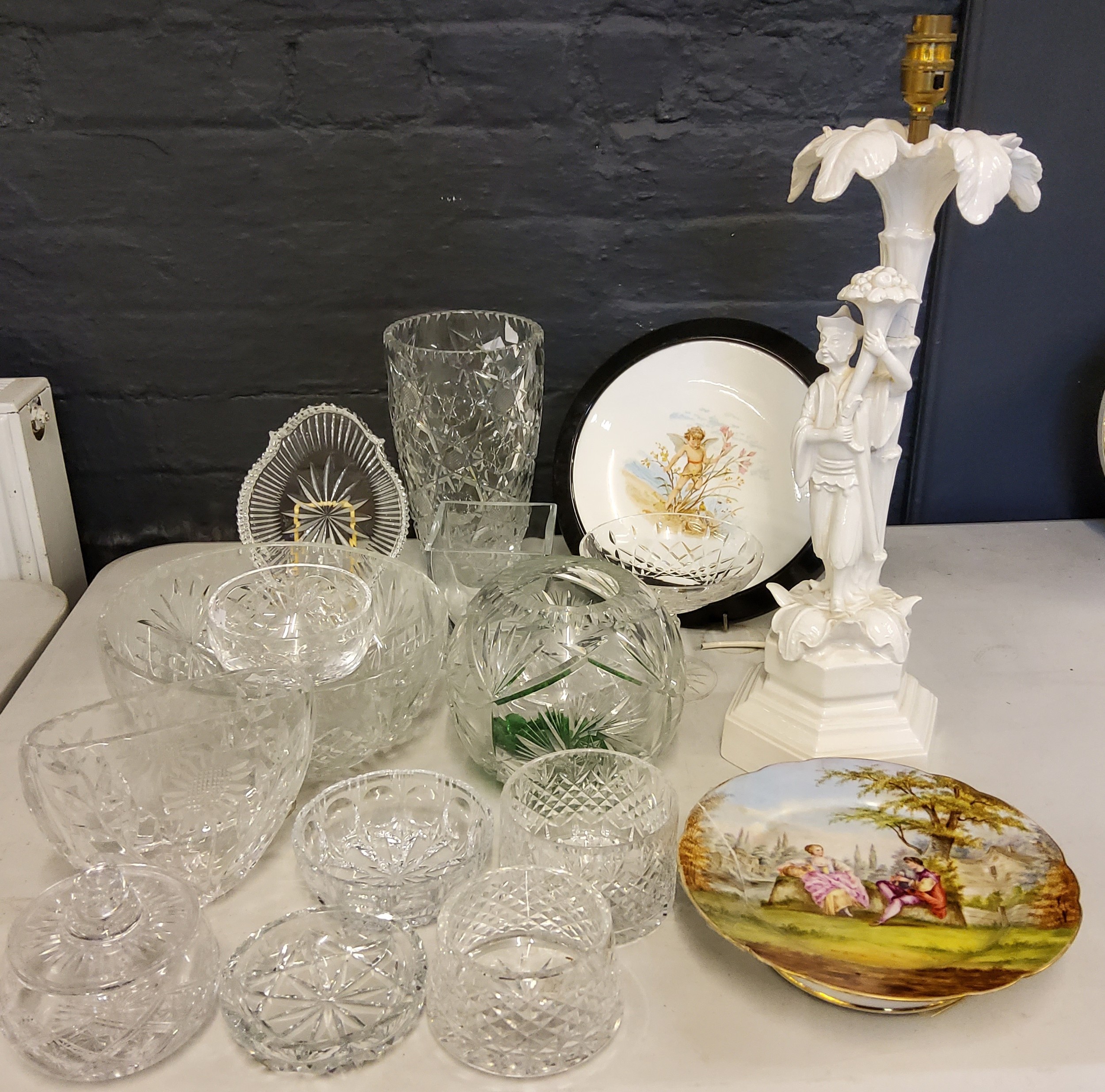 Glassware - a heavy cut glass vase;  others;  bowls;  tray;  A French shaped circular pedestal