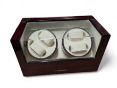 A Floureon high gloss lacquered wood and clear perspex quad watch winder,  complete with adapter