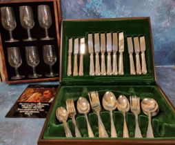 An E.P.N.S. canteen, for six, comprising soup spoons, dinner knives and forks, dessert knives, forks