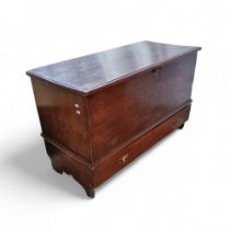 A George III oak mule chest, the hinged cover with studded initials and date, c.1760