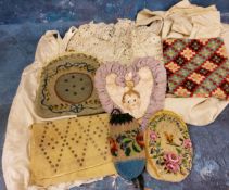 Textiles - a Victorian cotton night gown;  silk and lace child's clothes;  a heart shaped needle