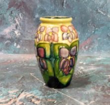 A Moorcroft Violet pattern vase, of small proportions, 11cm high, printed mark