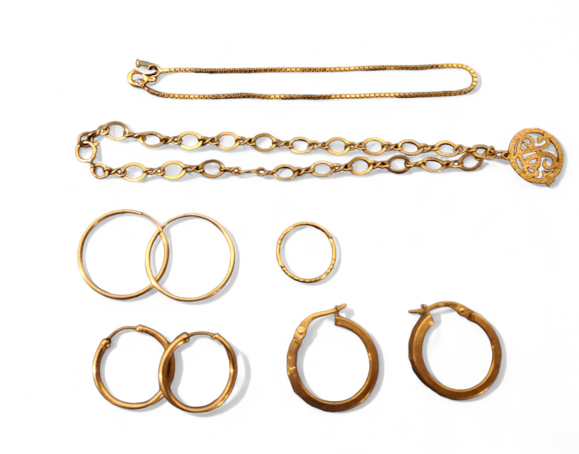 A 9ct gold bracelet; 9ct gold box link bracelet, a pair of 9ct gold hoop earrings; another two