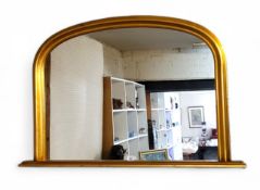 A 20th century giltwood arched rectangular overmantel mirror, 78cm high, 120cm wide