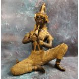 Thai School, 20th century, a gilt metal and bronze Thepphanom Buddha, playing a pipe, 43cm high