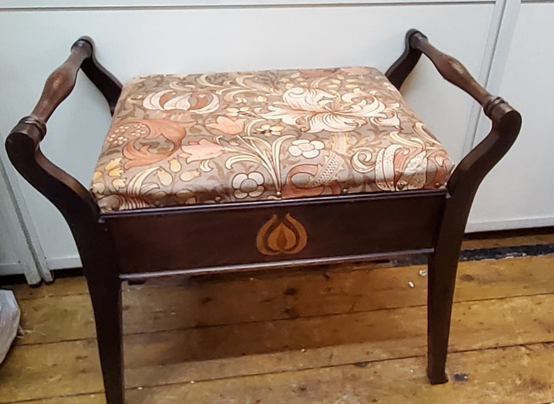 An early 20th century mahogany piano stool, inlaid in coloured woods, c.1915