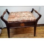 An early 20th century mahogany piano stool, inlaid in coloured woods, c.1915