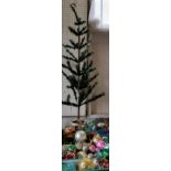 An early  20th century artificial Christmas tree, 110cm high, c.1920;   baubles, lights and other