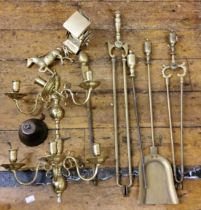 A pair of brass three light two branch wall sconces;   brass fire side implements, including