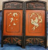 A Japanese lacquered two fold screen, inlaid in bone with ho-ho birds and foliage, 74cm high, 71cm