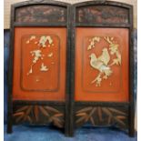 A Japanese lacquered two fold screen, inlaid in bone with ho-ho birds and foliage, 74cm high, 71cm