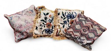 Soft Furnishings - Two tabriz fabric cushions and a pair of embroidered ribbon tied floral swags