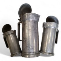 A set of three graduated 19th century French pewter flagons, Double Litre - Demi-Litre,  hinged